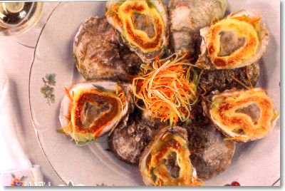 Sabayon gratiné d'huîtres Malpèque sur une julienne de légumes racines